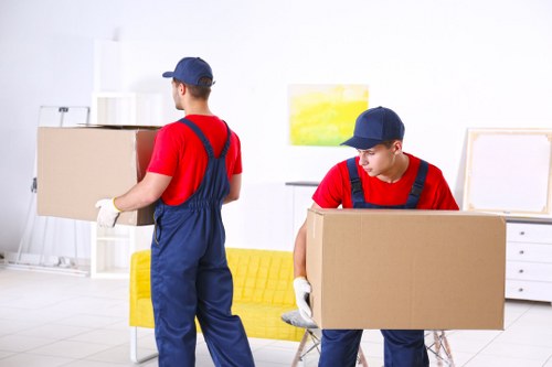 Removal van and boxes prepared for a flat move in Hampstead